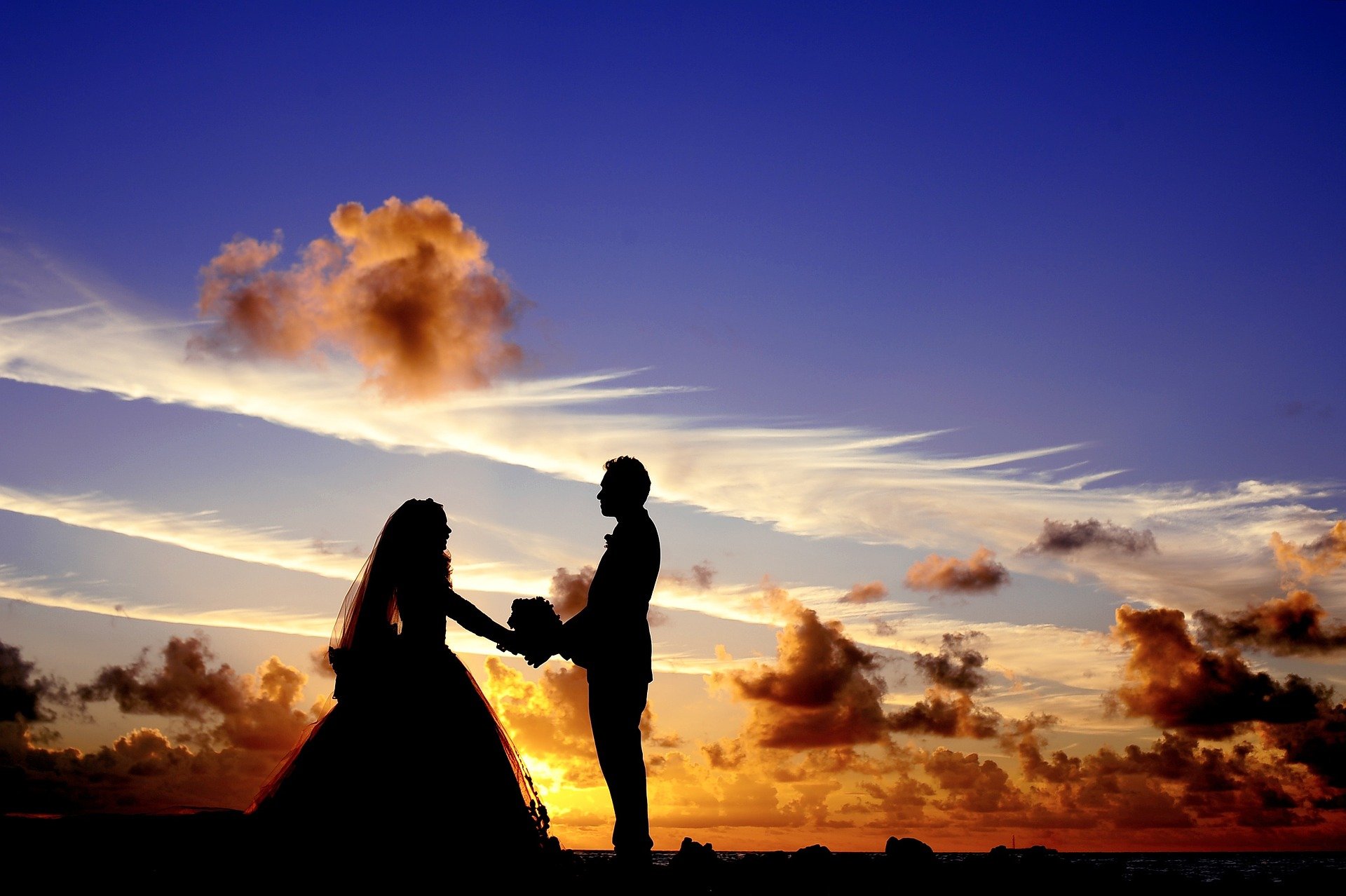 bridal couple at sunset